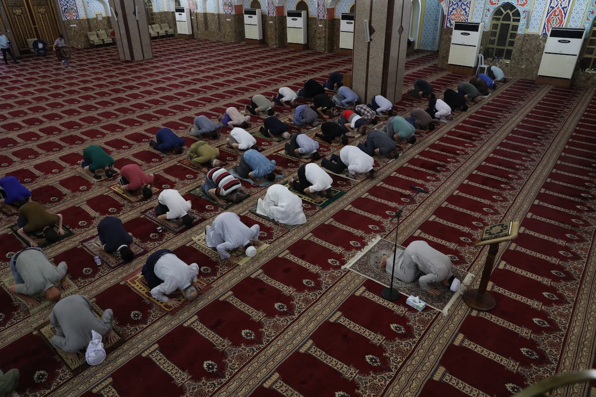 ERBIL, IRAQ – MAY 11: Muslims perform Tarawih prayer during the Islamic ...