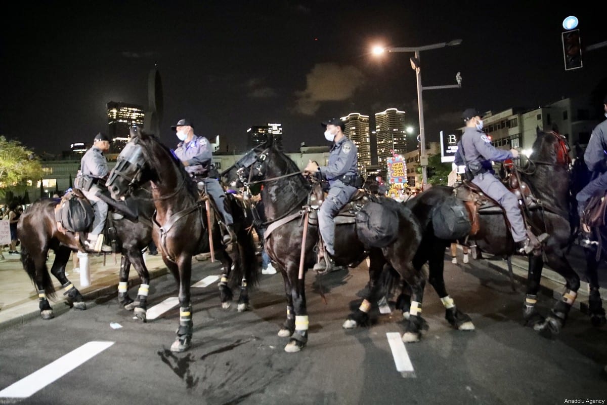 Thousands of Israelis protest against Netanyahu despite lockdown ...