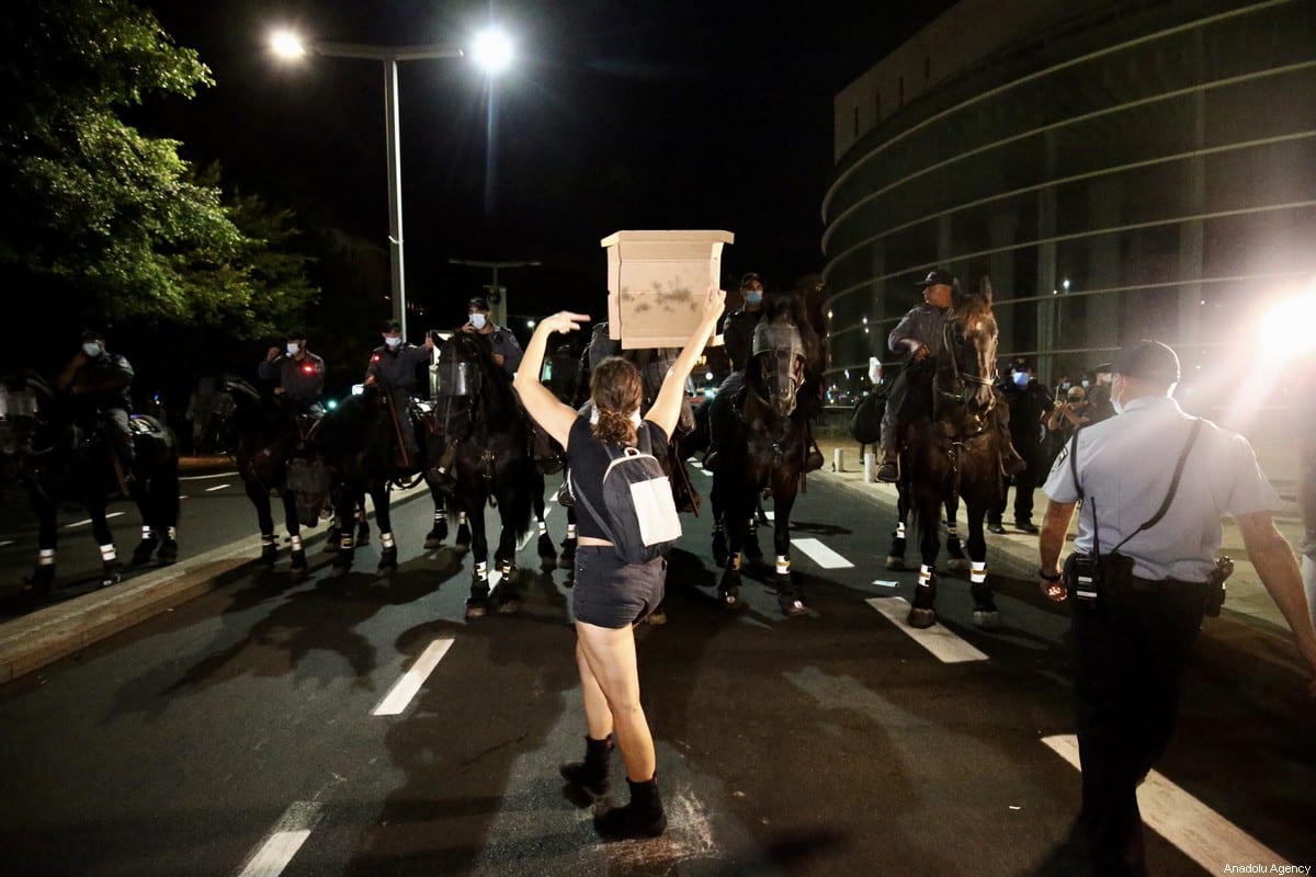 Thousands of Israelis protest against Netanyahu despite lockdown ...