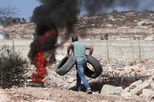 Palestinian demonstrators’ protest against Jewish settlements in Nablus ...