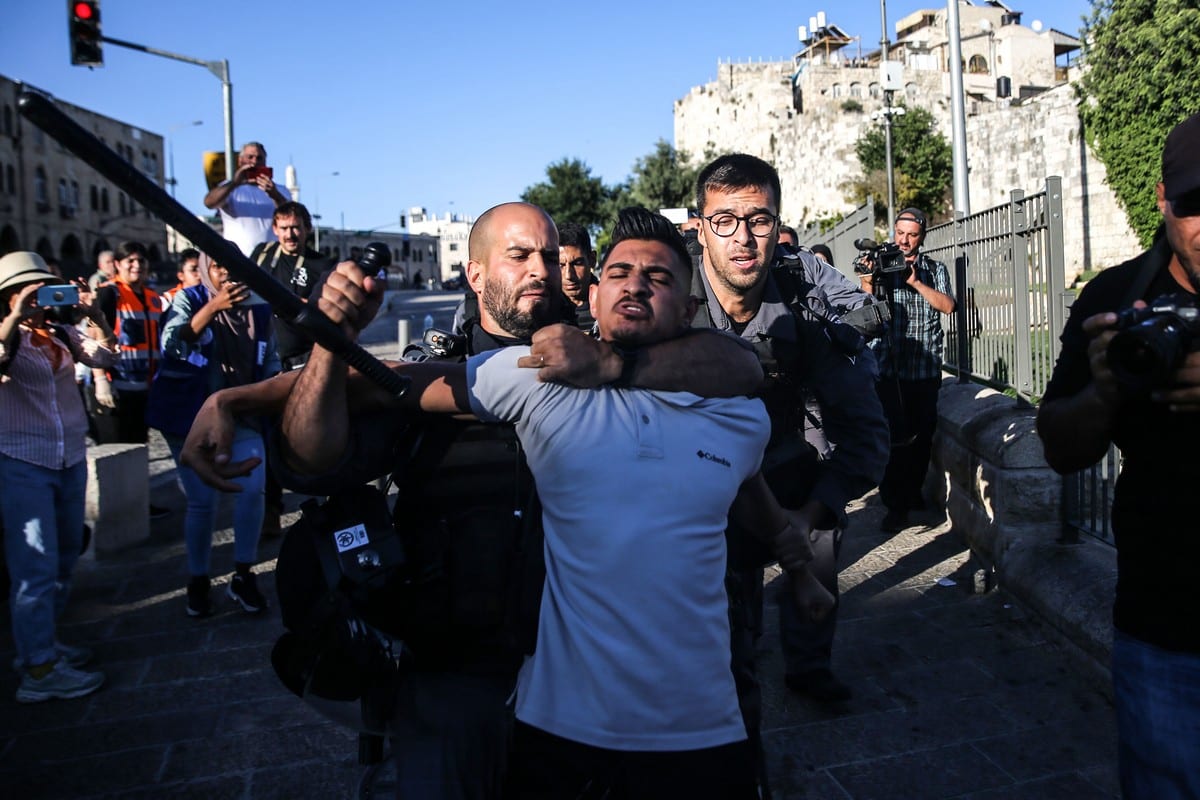 Israeli Forces Intervene In Palestinians Gather After Flag March In ...