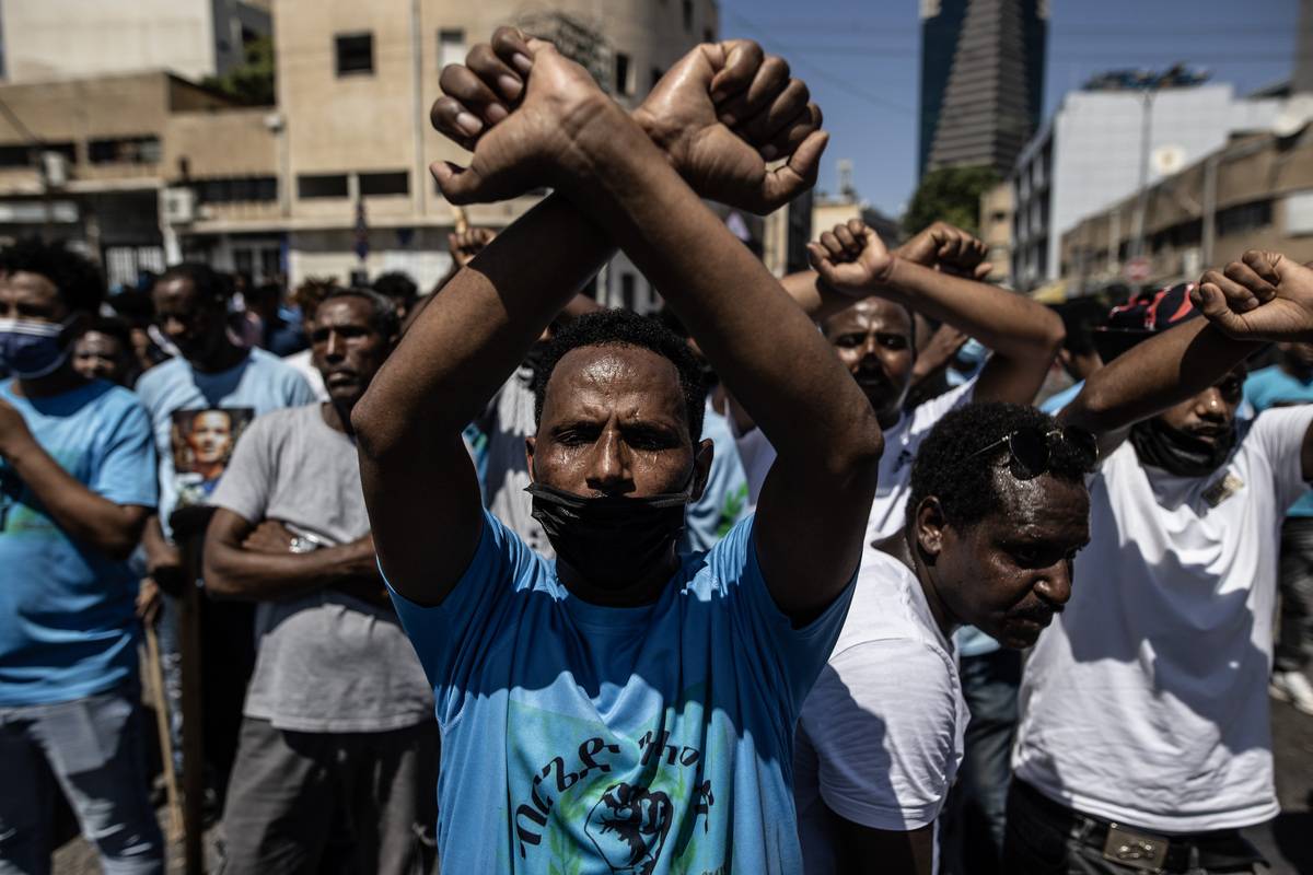 Eritrean asylum seekers protest in front of the Eritrean embassy building in Tel Aviv, Israel on September 2, 2023. Eritrean asylum seekers in Israel marched to the embassy building to protest an event organized by the Eritrean embassy in Tel Aviv. (Mostafa Alkharouf - Anadolu Agency)